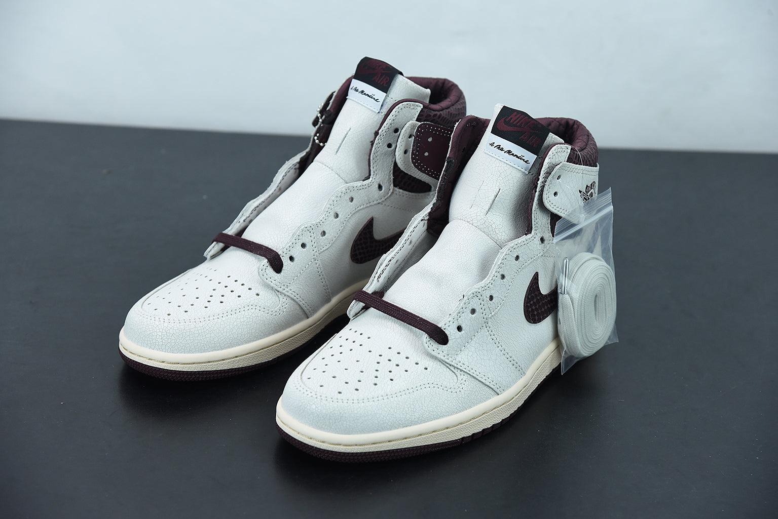 Nike Air Jordan 1 High Sail and Burgundy x A Ma Maniere